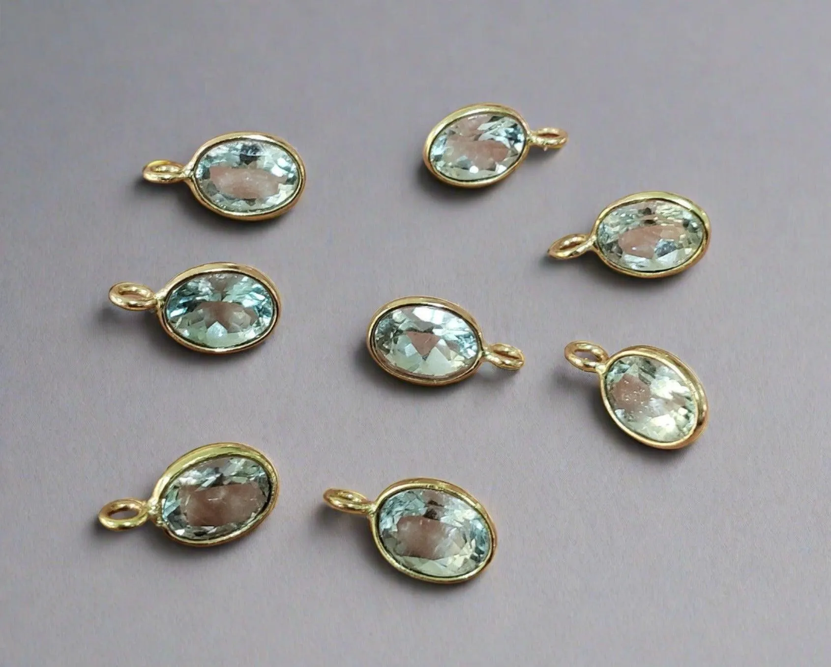 14k Gold Faceted Oval Shape Aquamarine Charm